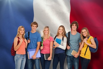 Smiling students wearing backpacks