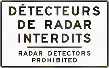 Bilingual regulatory road sign in Quebec, Canada - Rader detectors prohibited