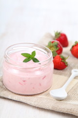 Strawberry yogurt and ripe strawberry