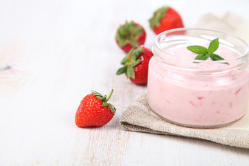 Strawberry yogurt and ripe strawberry