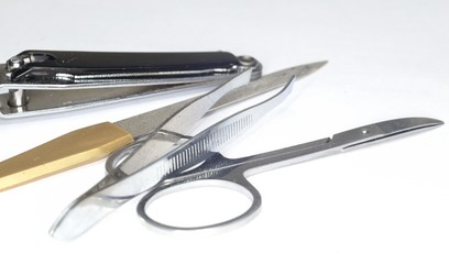 scissors, nail file, tweezers