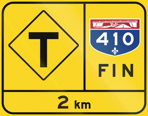 Warning road sign in Quebec, Canada - End of highway, T-Intersection. Fin means end