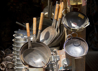 stack of metal cookware on market in Kathmandu, Nepal
