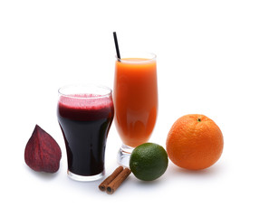 Fresh fruit and vegetable juices on white background