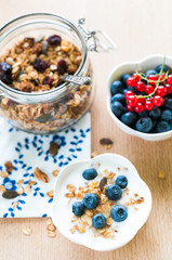 Healthy breakfast with granola, yogurt and fresh fruits