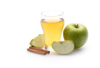 Apple juice in glass on white background