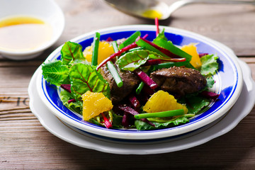 salad with beet and a chicken liver on