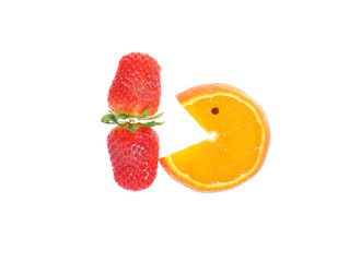 Strawberry and orange slice on white background