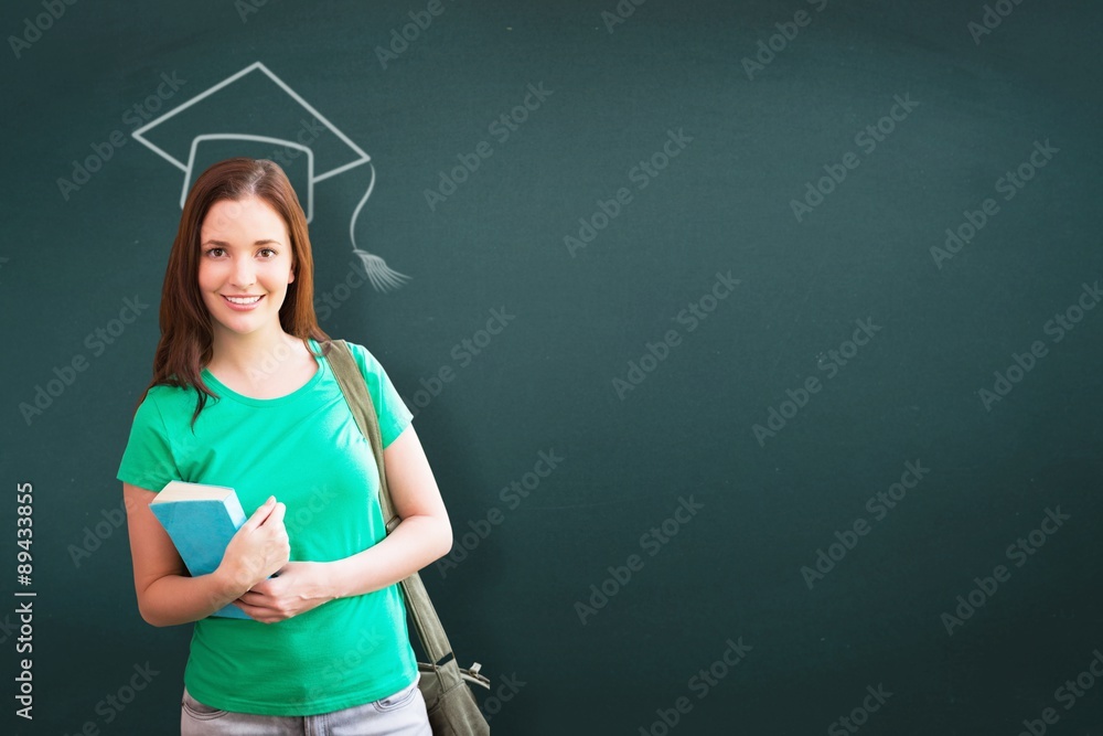 Poster Composite image of student smiling at camera in library