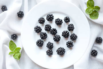 Healthy organic blackberry vegetarian diet sweet snack on white