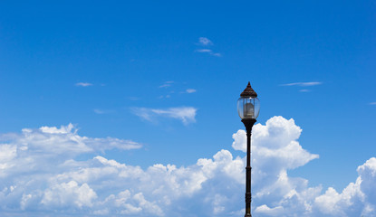 Fototapeta na wymiar Garden lamp on blue sky background