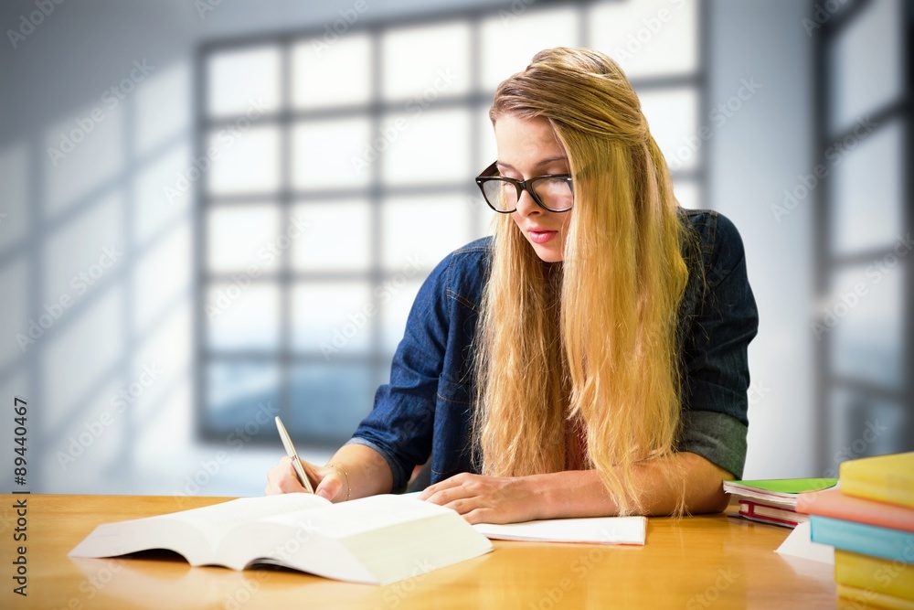 Poster composite image of student studying in the library