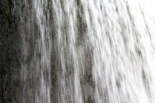 Image of waterfall and vegetation under water