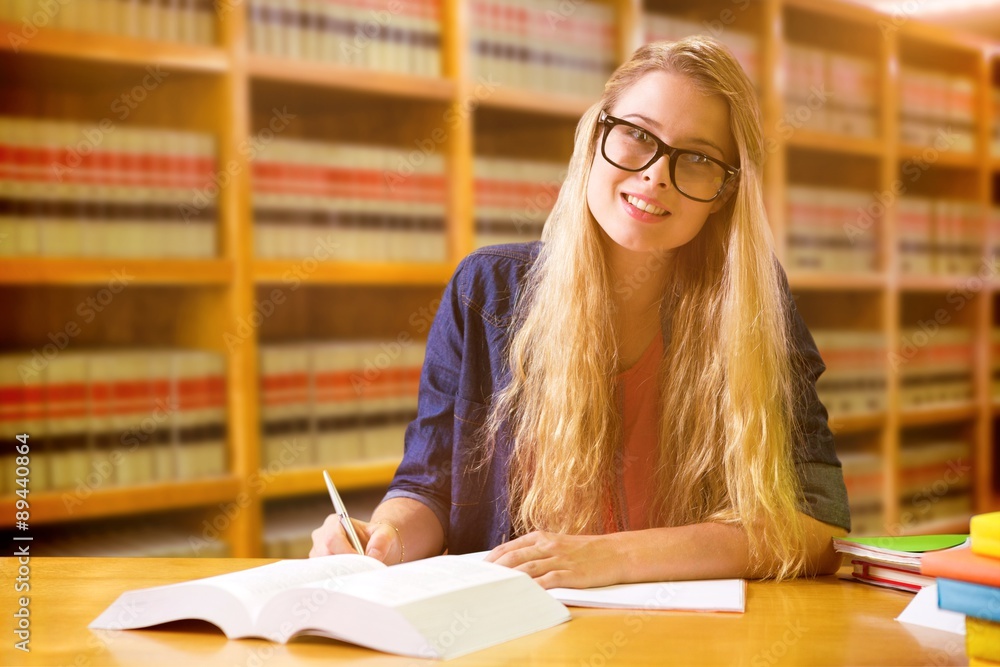 Poster composite image of student studying in the library