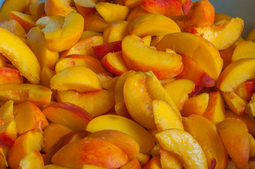 Fresh Organic Peaches  Heap Of ripe peach slices. Cooking jam
