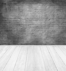 emty room with dark brick wall