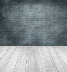 emty room with dark brick wall