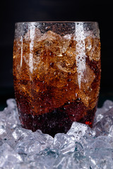 Glass of soda drink with ice