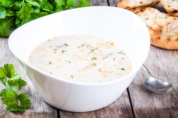 homemade soup with salmon and cream with croutons