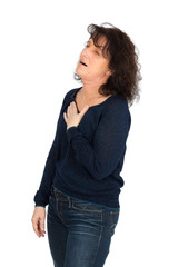 Obraz premium Beautiful woman doing different expressions in different sets of clothes: heart attack