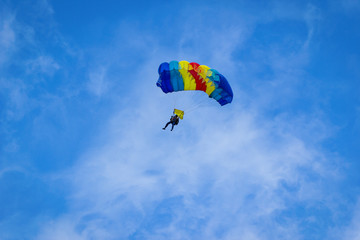 Fototapeta na wymiar parachutist in the sky