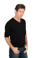 Fototapeta premium Handsome man doing different expressions in different sets of clothes: blinking