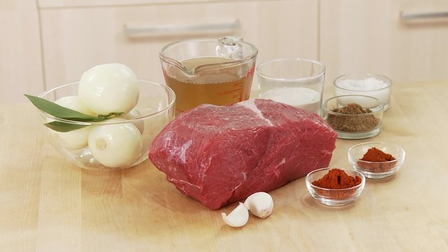 Ingredients for goulash: shoulder of beef, onion, garlic and spices