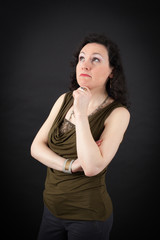Naklejka premium Beautiful woman doing different expressions in different sets of clothes: thinking