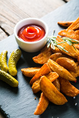 Fried potatoes and ketchup