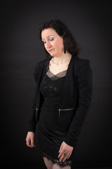 Beautiful woman doing different expressions in different sets of clothes: sad