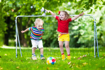 Kids playing football in school yard