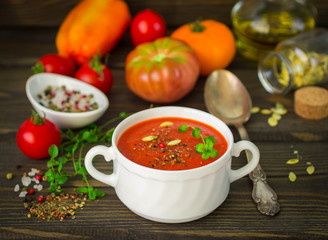 Homemade thick soup made of tomatoes and roasted bell peppers