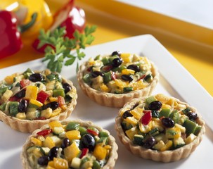 Four vegetable tarts
