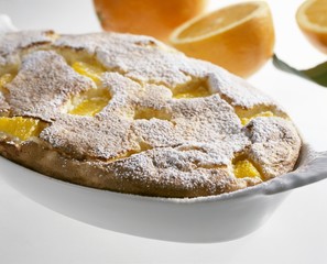 Baked rice pudding with oranges