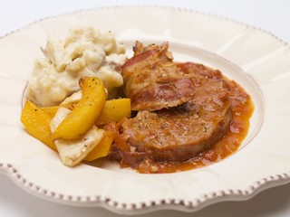 Bacon-wrapped meatloaf with mashed potato