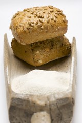 Seed buns on old flour scoop