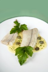 Eel fillets with caper sauce