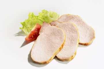 Three slices of roast pork loin