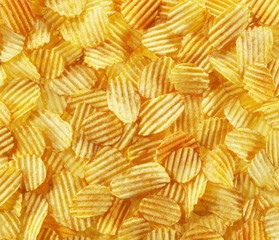 Spicy potato crisps with paprika (full-frame)