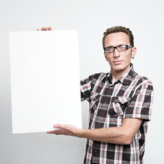 Man displaying a white board