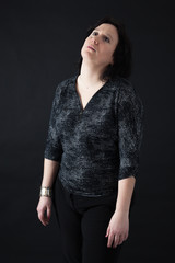 Beautiful woman doing different expressions in different sets of clothes: tired