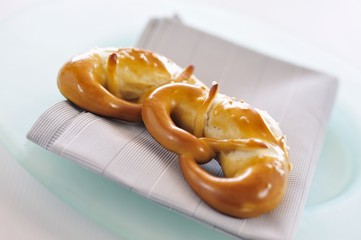 Two fresh soft pretzels