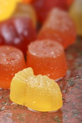 Assorted wine gums with drops of water