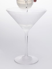 Pouring Martini into glass