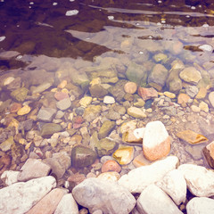Water and stones on the beach