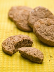 Cinnamon biscuits on yellow background