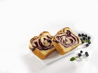 Two slices of blueberry cake