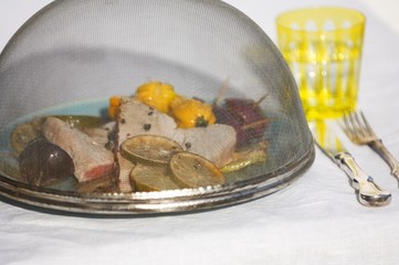 Tuna steak with grilled vegetables under fly cover