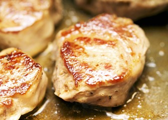 Browning lamb in frying pan