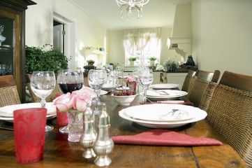 Laid dining table in living room